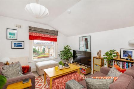 Bright and inviting living room scene.png