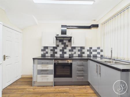 LIVING AREA/KITCHEN/DINING AREA