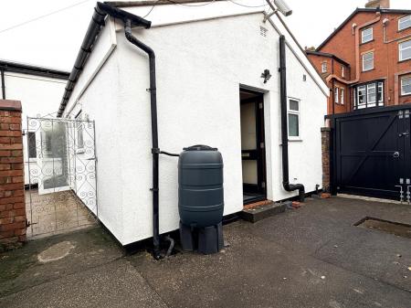 REAR COURTYARD/PARKING SPACE