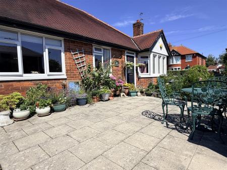 FRONT & SIDE GARDENS