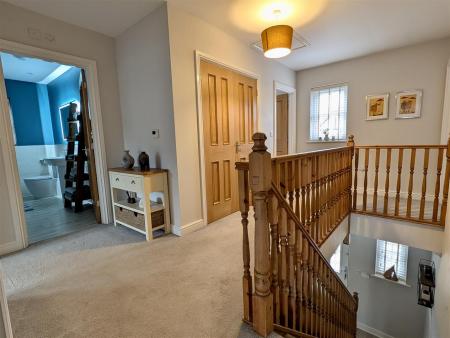 FIRST FLOOR LANDING