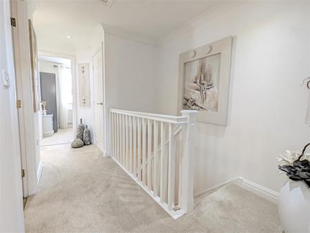 FIRST FLOOR LANDING
