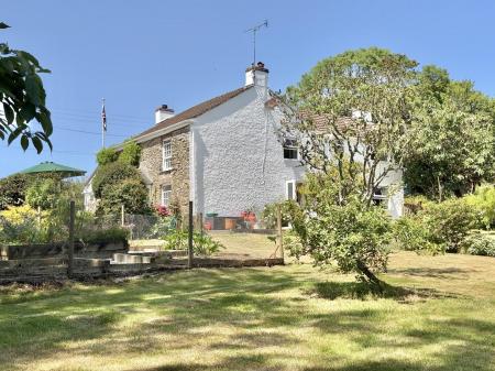 Cottage from orchard