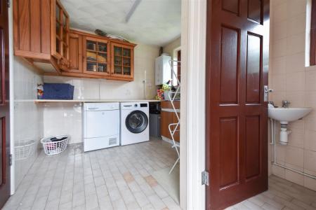 Utility room within garage