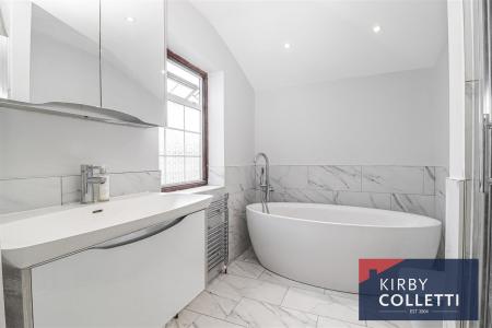 RE-FITTED BATH/SHOWER ROOM