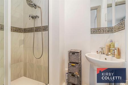 EN SUITE SHOWER ROOM TO BEDROOM ONE