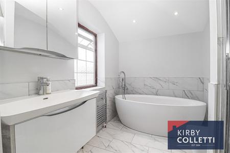 RE-FITTED BATH/SHOWER ROOM