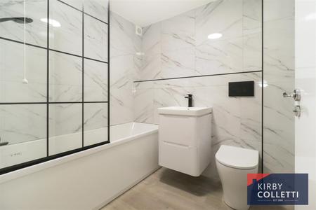 RE FITTED BATHROOM