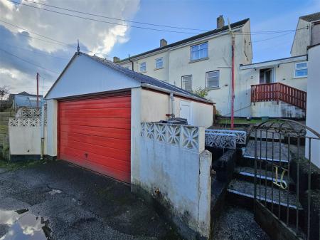 Rear of the property, parking, garage.jpg