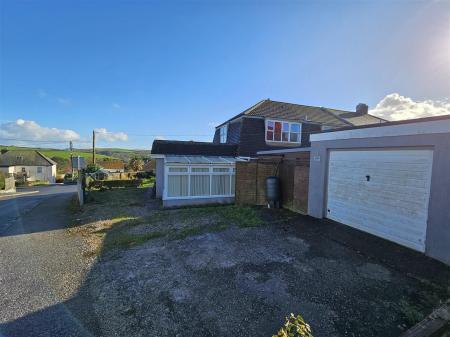 Rear of property, parking, garage