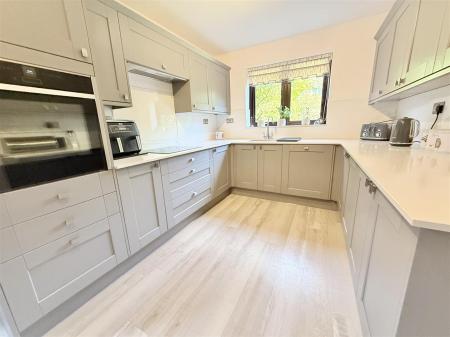 Fitted Kitchen With Utility Area