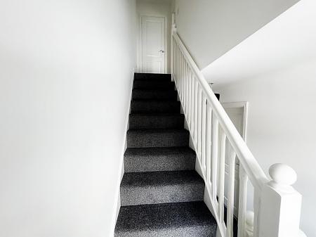 Stairs to second floor