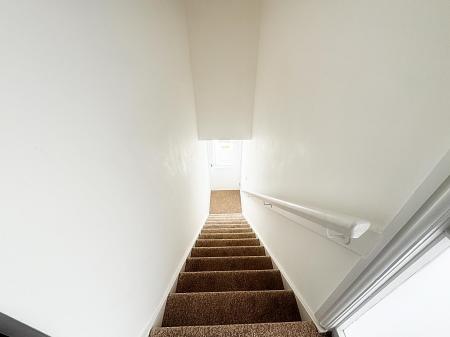 Stairs to first floor
