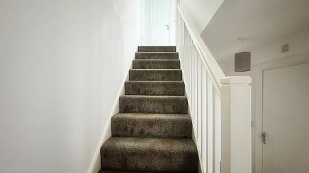 Stairs to second floor landing