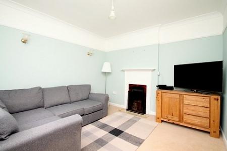 Lounge with feature Fireplace