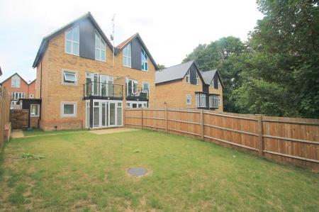 Rear shot showing balcony