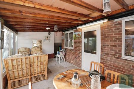 Covered area outbuilding