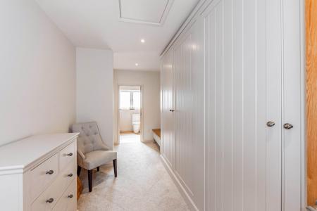 DRESSING AREA TO BEDROOM ONE