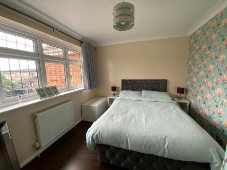 BEDROOM THREE 12' x 9'5