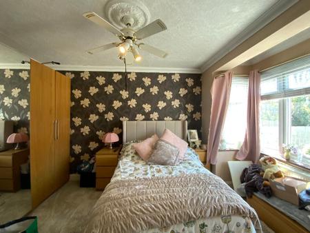BEDROOM ONE 15'1 x 10'2