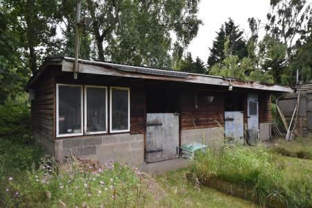 TIMBER STABLES COMPRISING:
