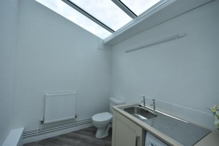 CLOAK/UTILITY ROOM