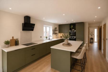 Plots 3, 5 & 7 - staged kitchen.png