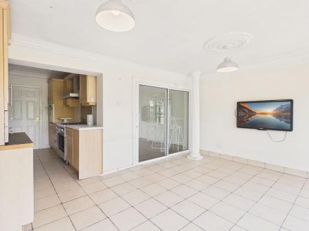 Kitchen/Sun Room Area