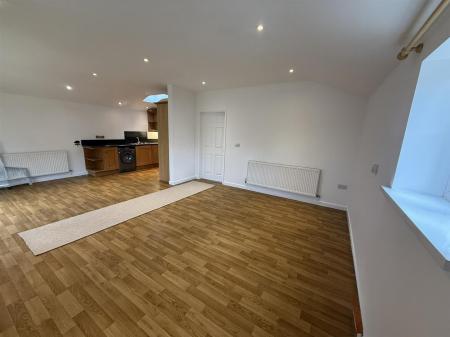 Open plan living / kitchen / dining room