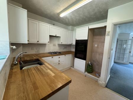 Kitchen through to Lounge