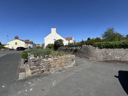 View from Pavement by Driveway towards House