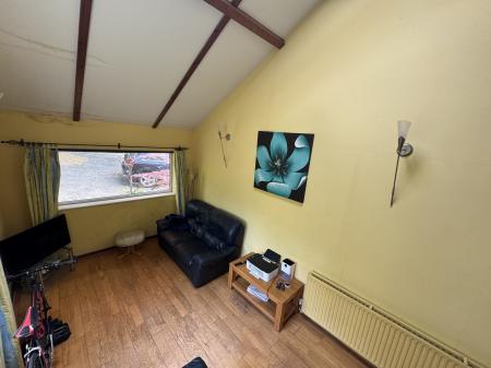 STUDY LOOKING DOWN TO FAMILY ROOM