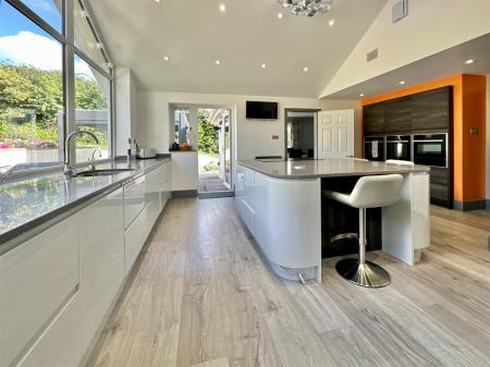 Kitchen Towards Living Room & Gardens.JPG