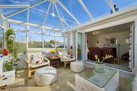 Conservatory Into Living Room.png