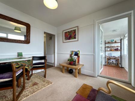 Sitting Room Towards Porch.JPG