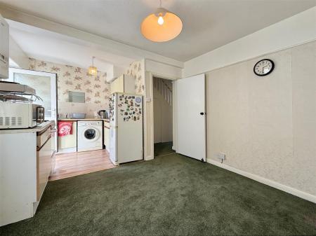 Dining Area Into Kitchen.JPG
