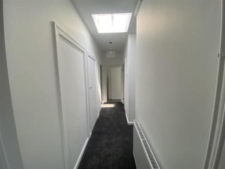 Hallway with fitted cupboards